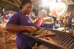 Woman getting food at a carnival