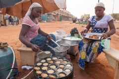 Women cooking sorghum