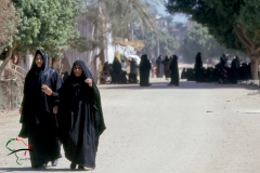 Women walking around wearing hijabs in Luxor, Egypt