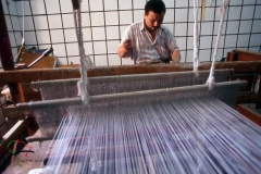 Man making carpets on a loom in Saqqara, Egypt