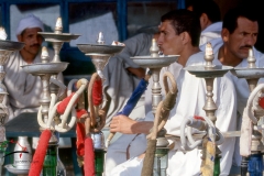 Men smoking hookah in Birqash, Egypt