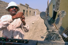 Man using a spinning wheel in Cairo, Egypt