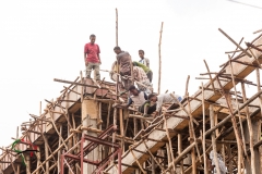 Construction workers on scaffolding