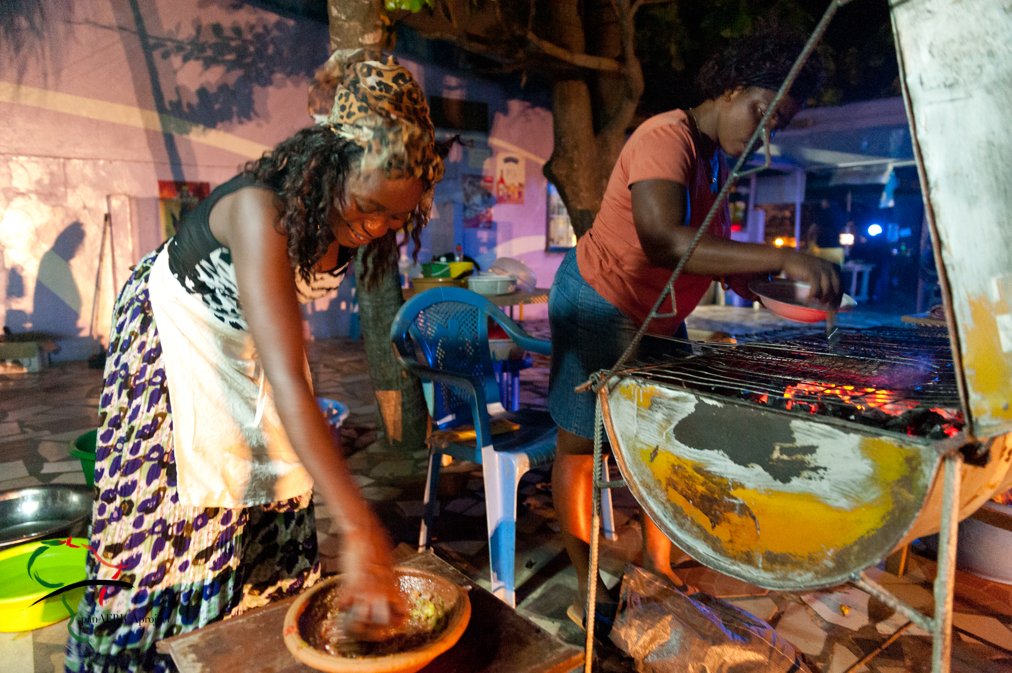 Women cooking, in Accra, Ghana