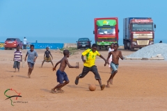 Boys playing soccer in Accra, Ghana