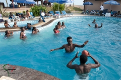 People playing football in a pool in Accra, Ghana