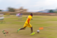 Scocer player running during a match