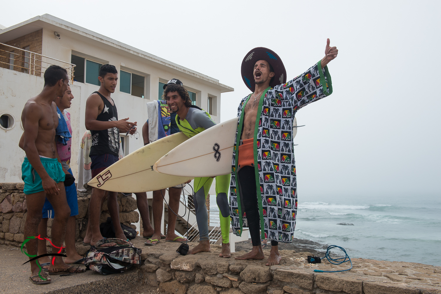 A group of portrait of surfers