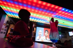 Woman having a drink at a club
