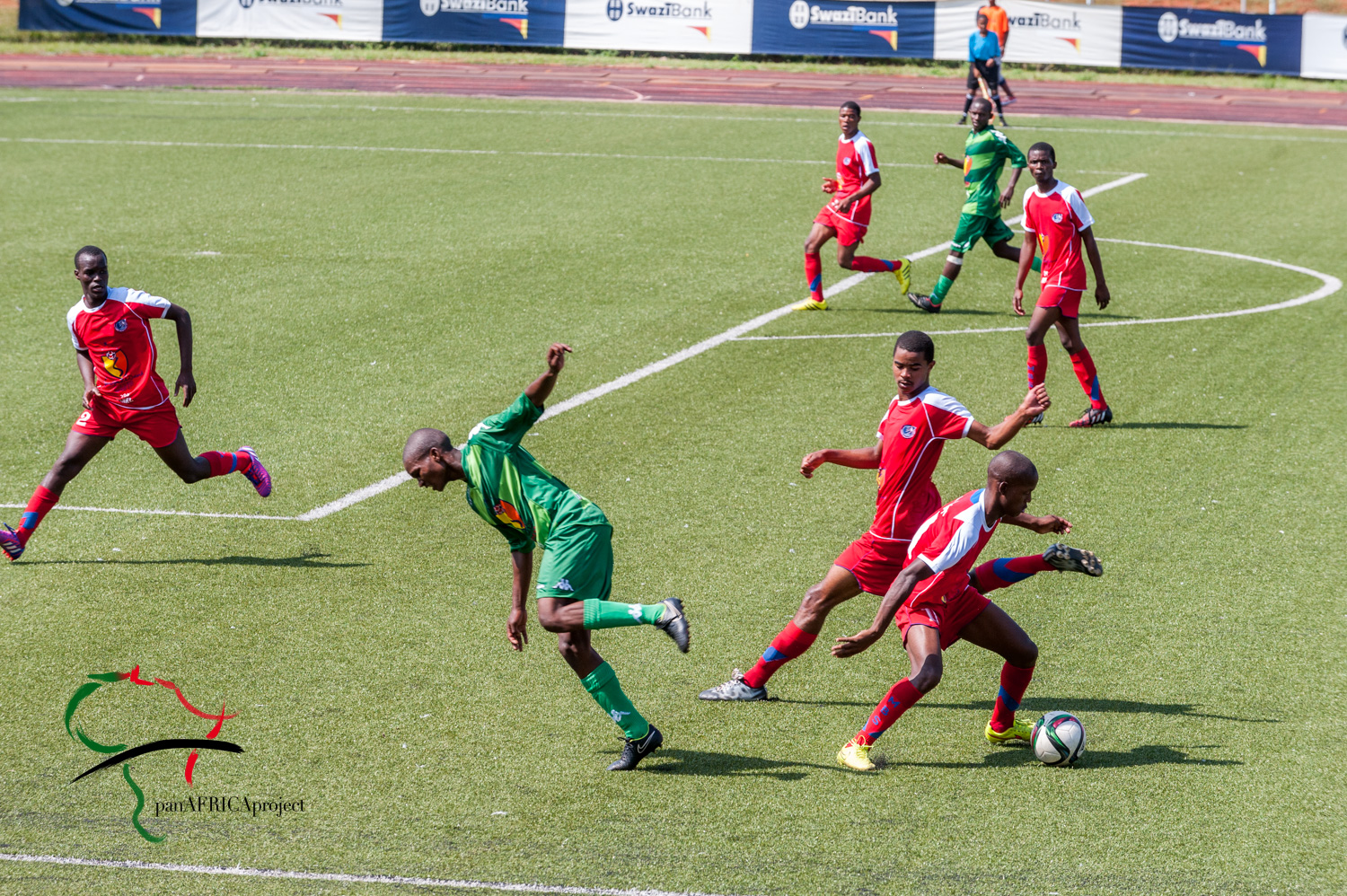 Athletes playing in a soccer match