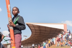 Child spectator observing soccer match