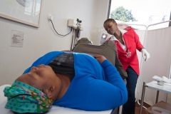 Doctor performing a pap smear on patient
