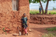 Children hanging out in a yard