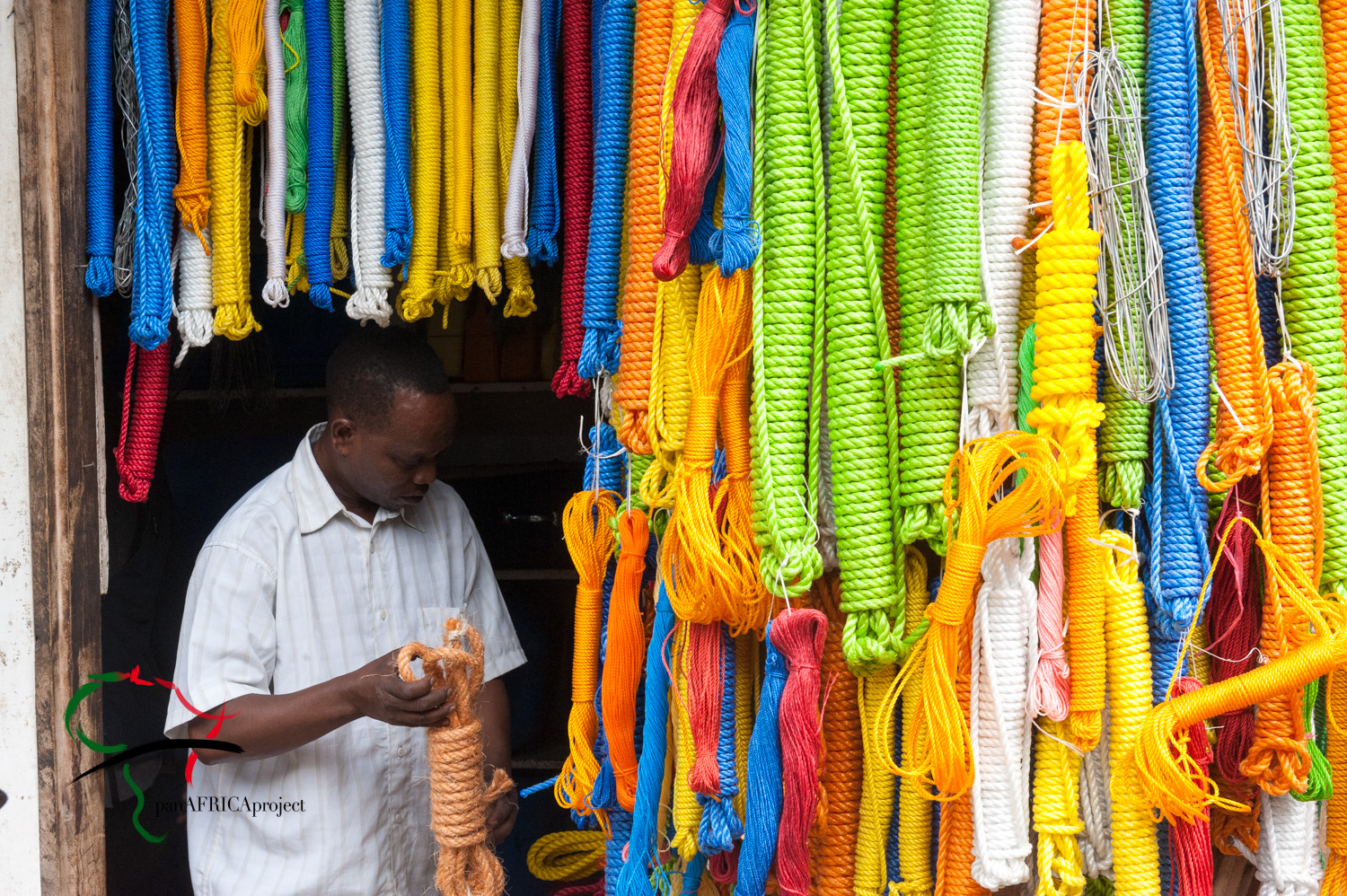 A man selling rope