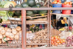 A woman selling vegetables