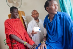 A patient getting his blood pressure tested