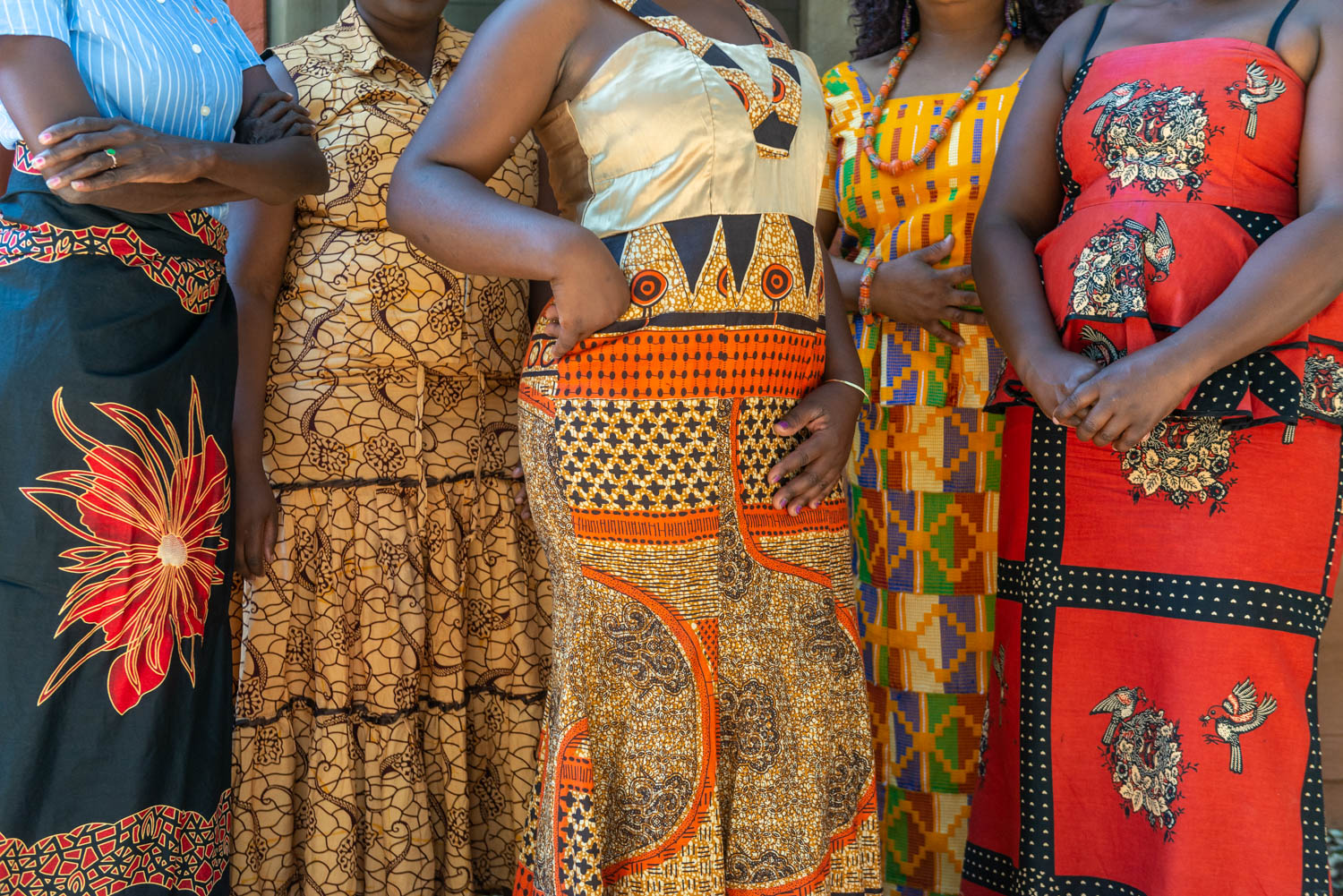 Women wearing dresses made out of chitenge cloth