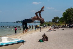 Boy prefroming a back flip
