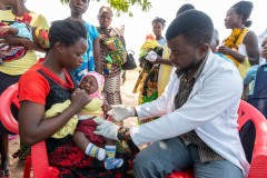 Infant receiving an inoculation