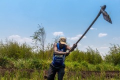 Farmer tilling soil