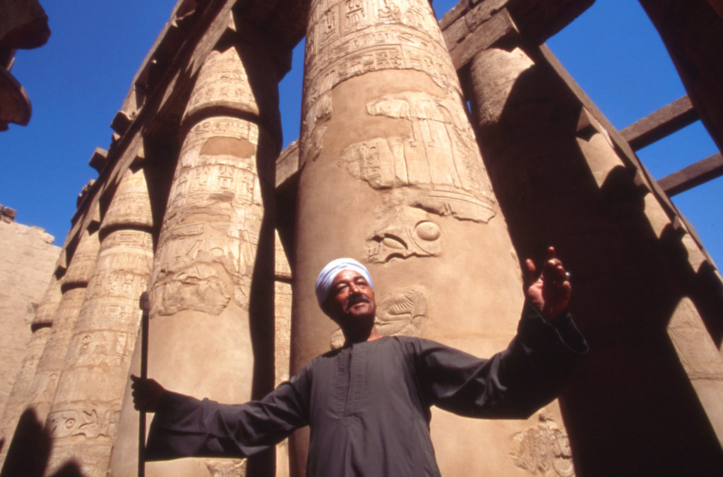 Historian standing in front of the Karnak Temple Complex