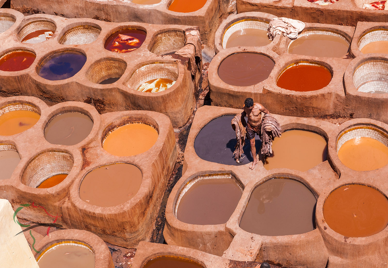 vats for dying leather in Chouara Leather Tannery. Fes