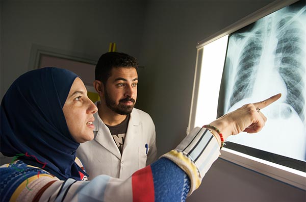Doctors examining a x-ray of lungs at Centre Hospitalier Universitaire Mohammed VI